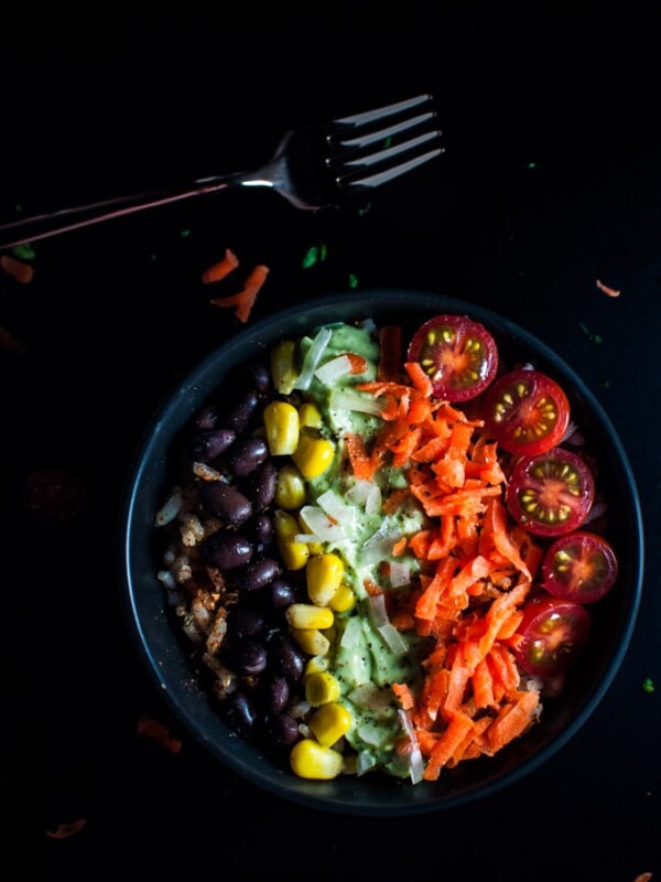 Tex Mex rice bowls with avocado lime cilantro dressing - these colorful vegetarian rice bowls are healthy, delicious, and quick to assemble.