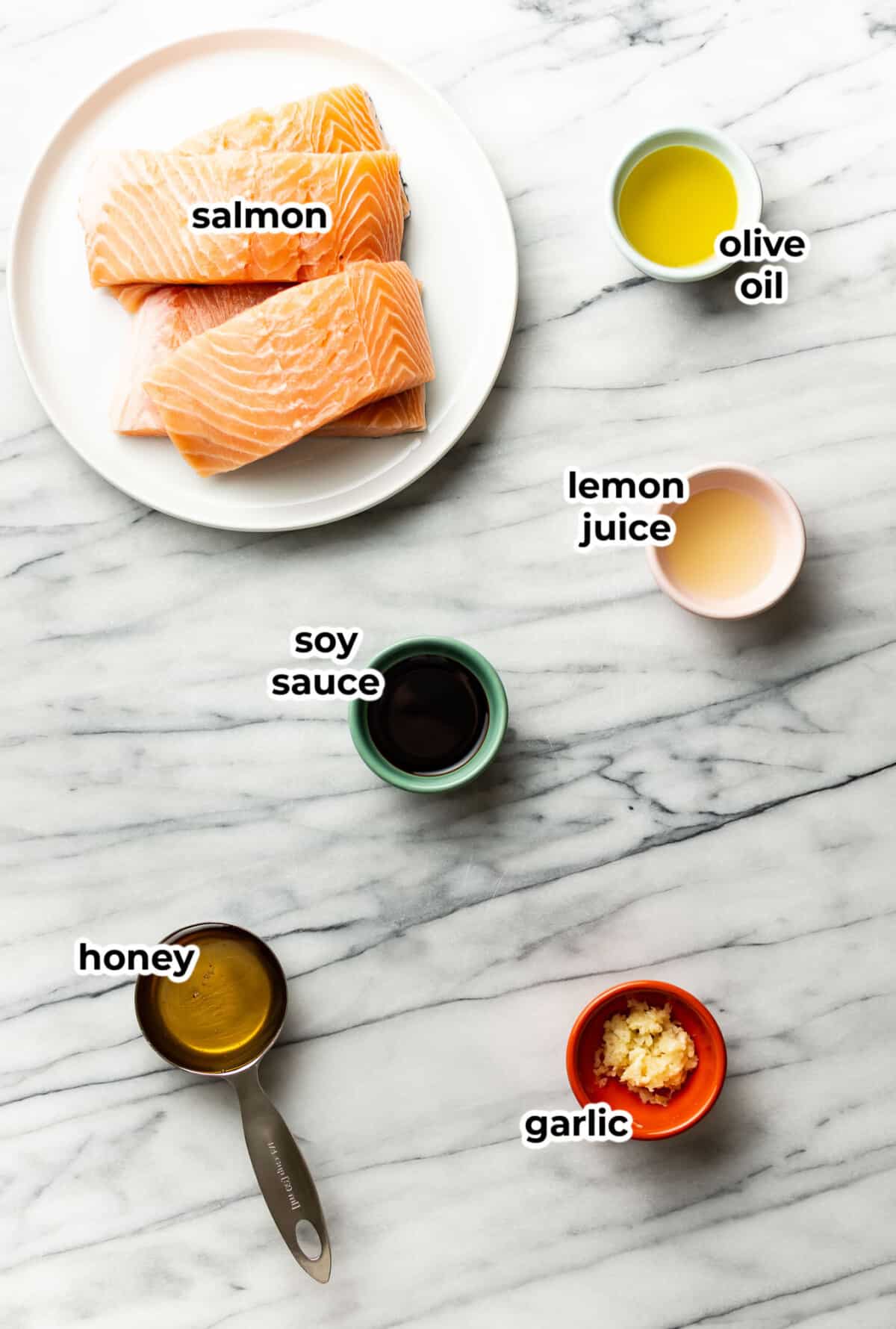 ingredients for honey garlic salmon in prep bowls