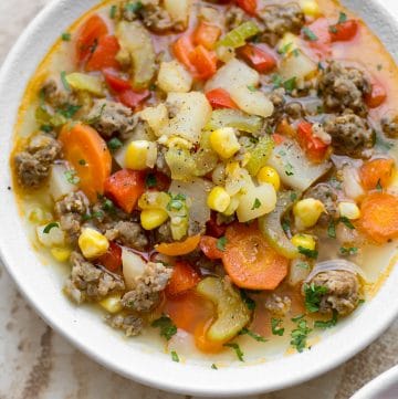 This easy sausage and vegetable soup is total comfort food! The whole family will love this delicious meal.