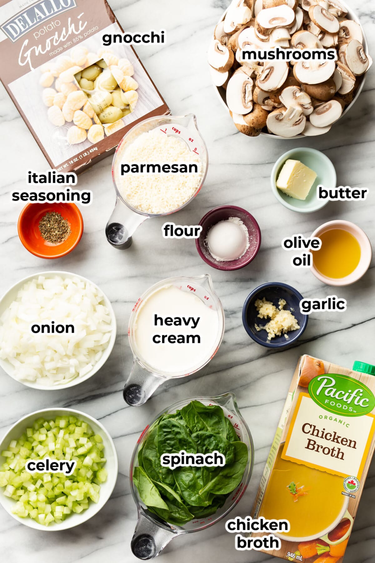 ingredients for mushroom spinach gnocchi soup in prep bowls