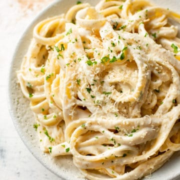 easy Alfredo sauce with cream cheese (Fettuccine Alfredo) in a white bowl