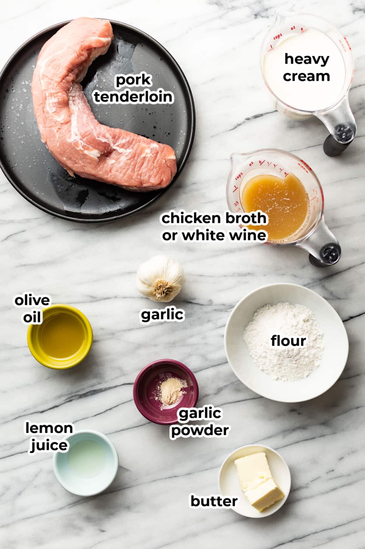 ingredients for creamy garlic pork tenderloin in prep bowls