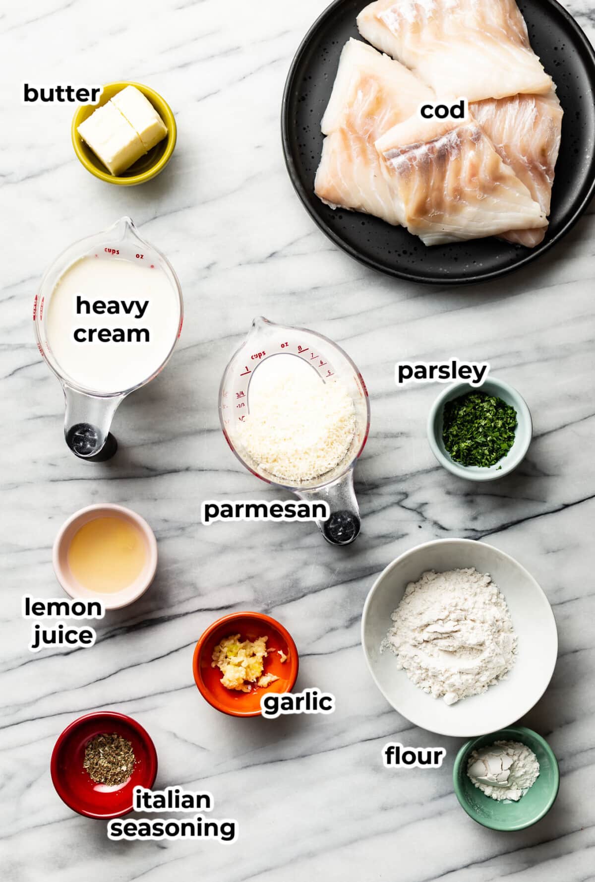 ingredients for creamy lemon parmesan cod in prep bowls