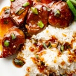 a plate with honey garlic pork tenderloin, rice, and green beans