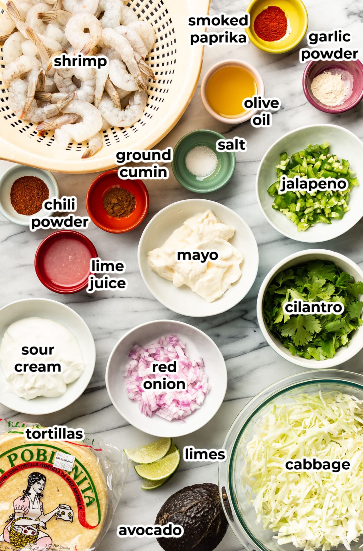 ingredients for shrimp tacos in prep bowls