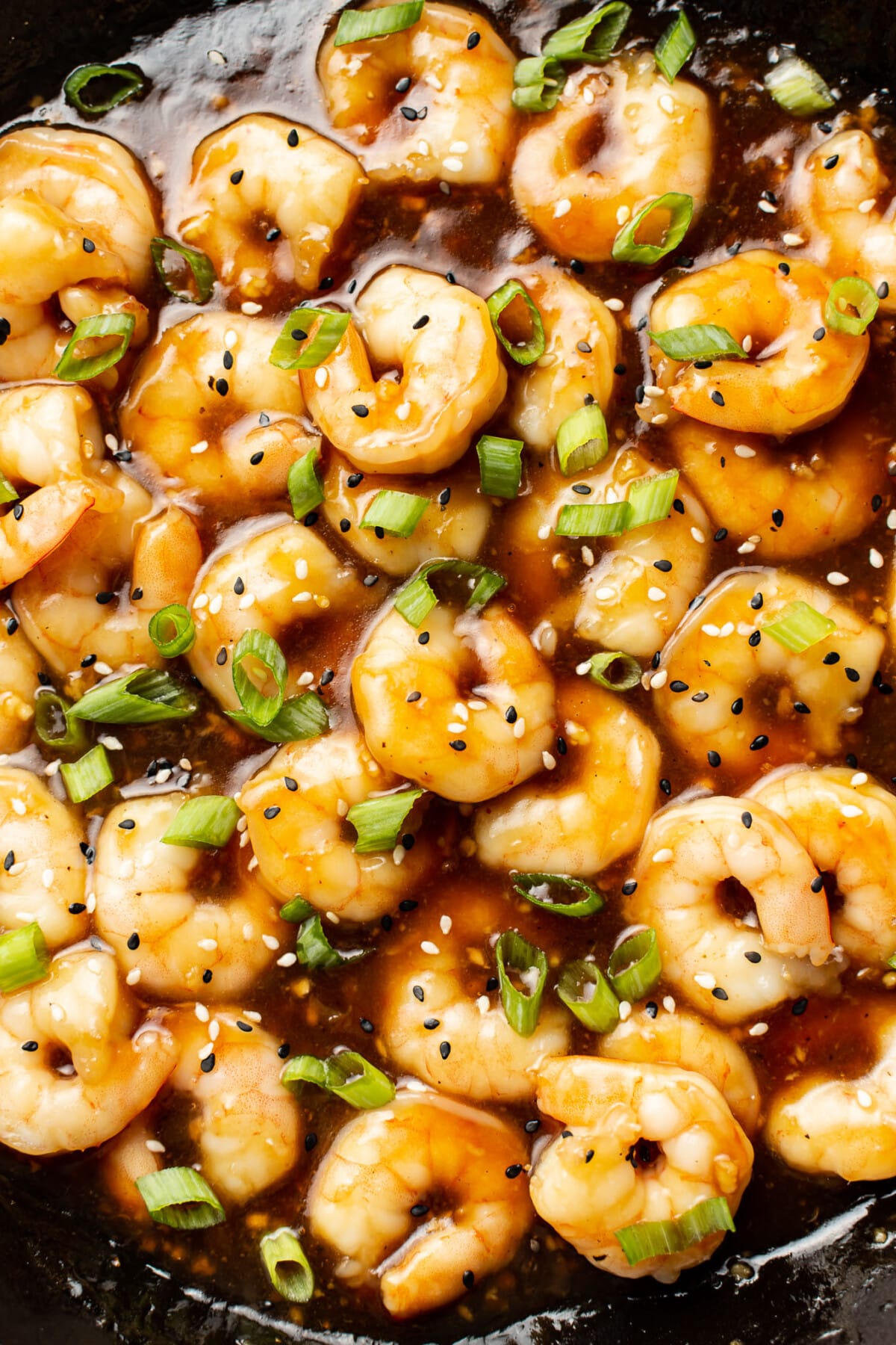 closeup of a skillet with honey garlic shrimp