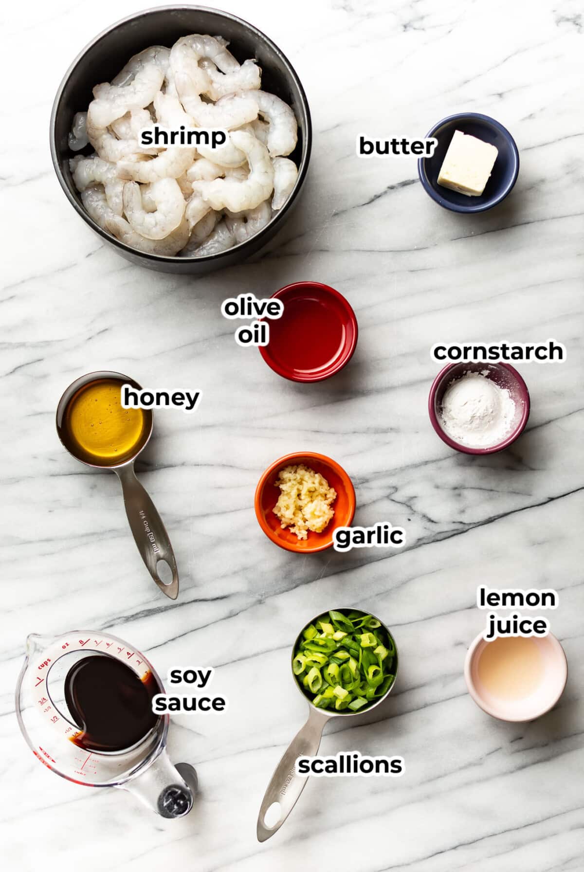 ingredients for honey garlic shrimp in prep bowls