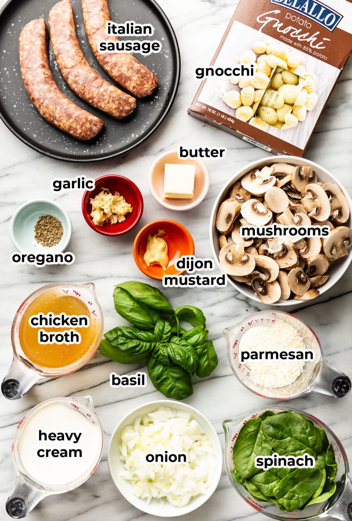 ingredients for italian sausage mushroom gnocchi in prep bowls