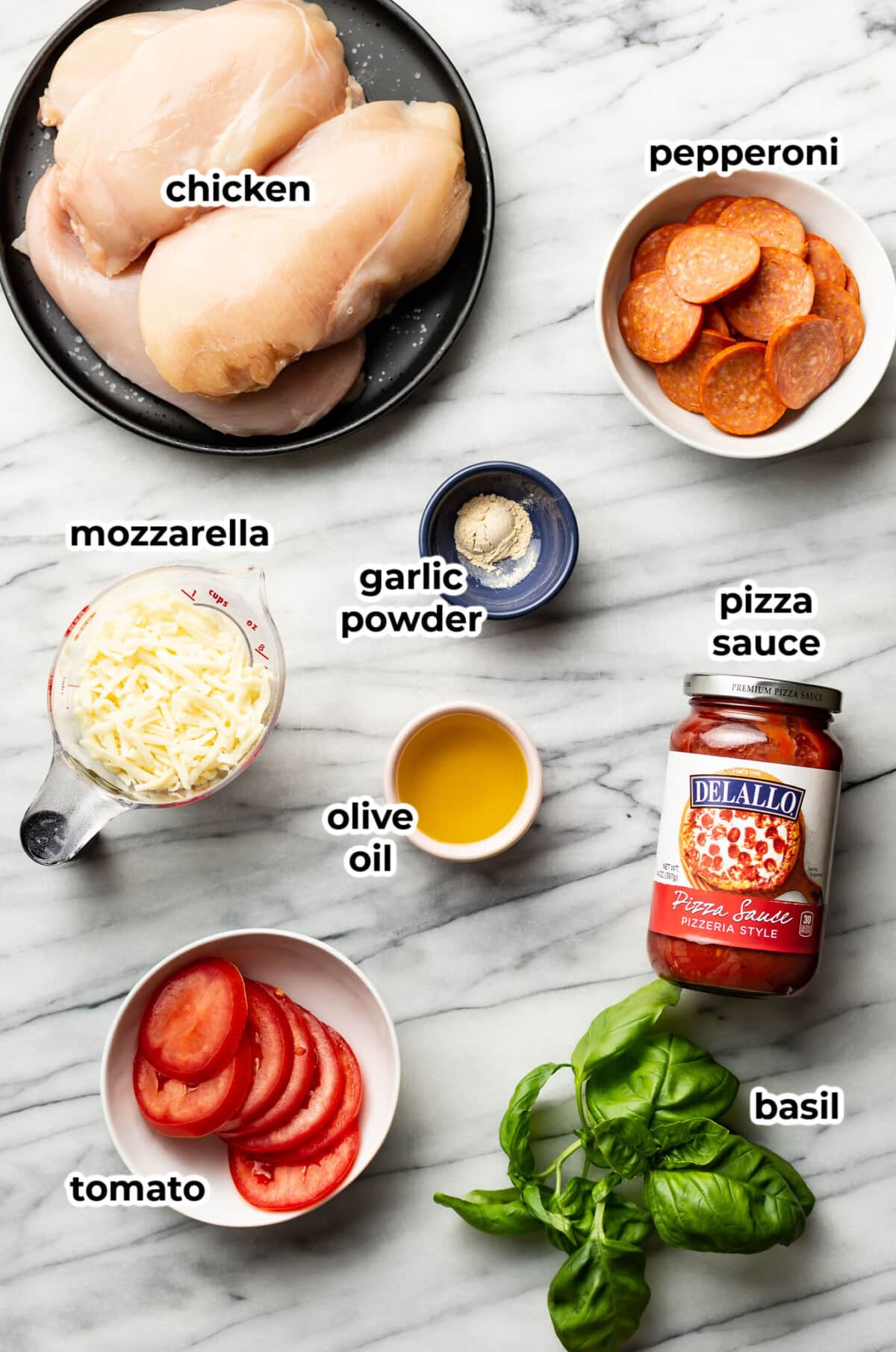 ingredients for pizza chicken in prep bowls