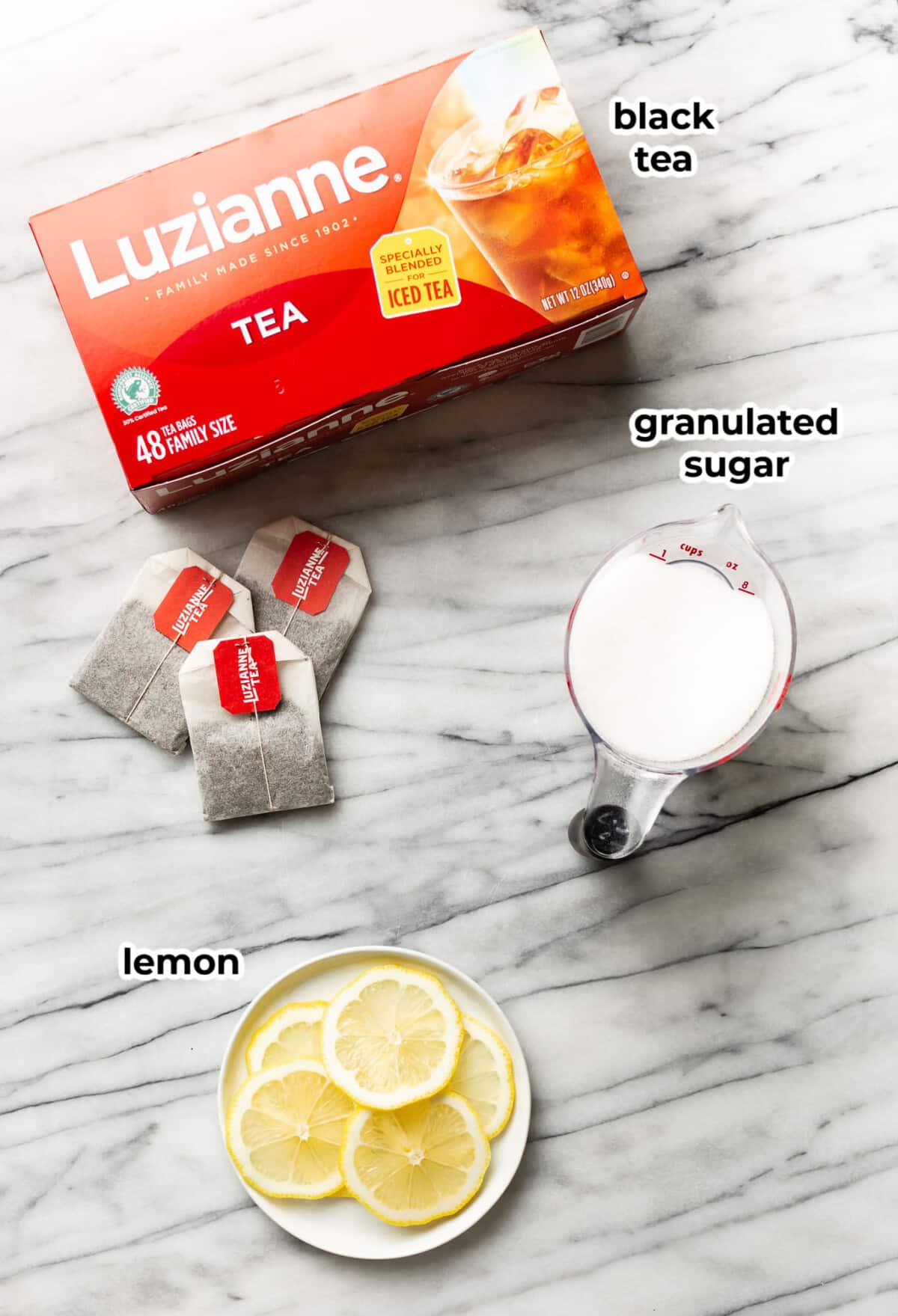 ingredients for sweet tea on a marble surface