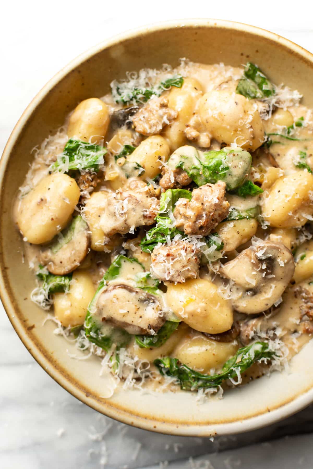 a bowl of italian sausage mushroom gnocchi