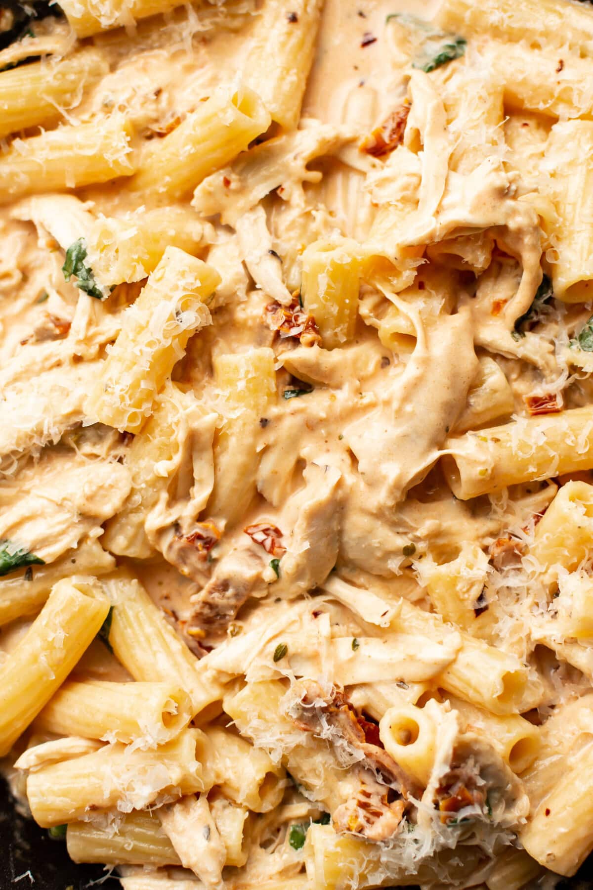 closeup of a skillet with marry me chicken pasta