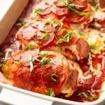 a casserole dish with pizza chicken