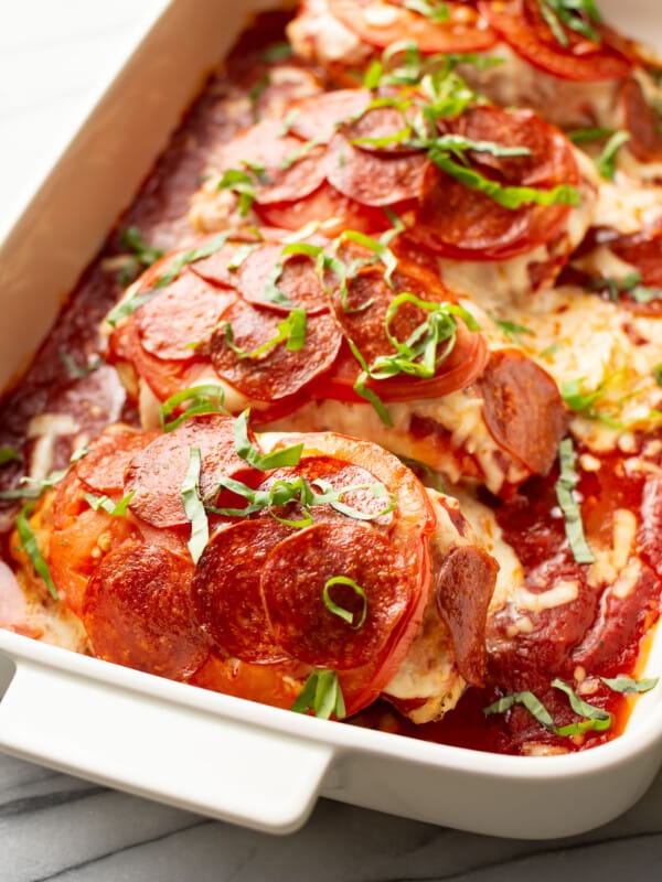 a casserole dish with pizza chicken