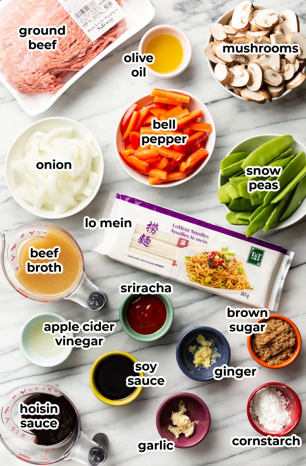 ingredients for ground beef lo mein in prep bowls