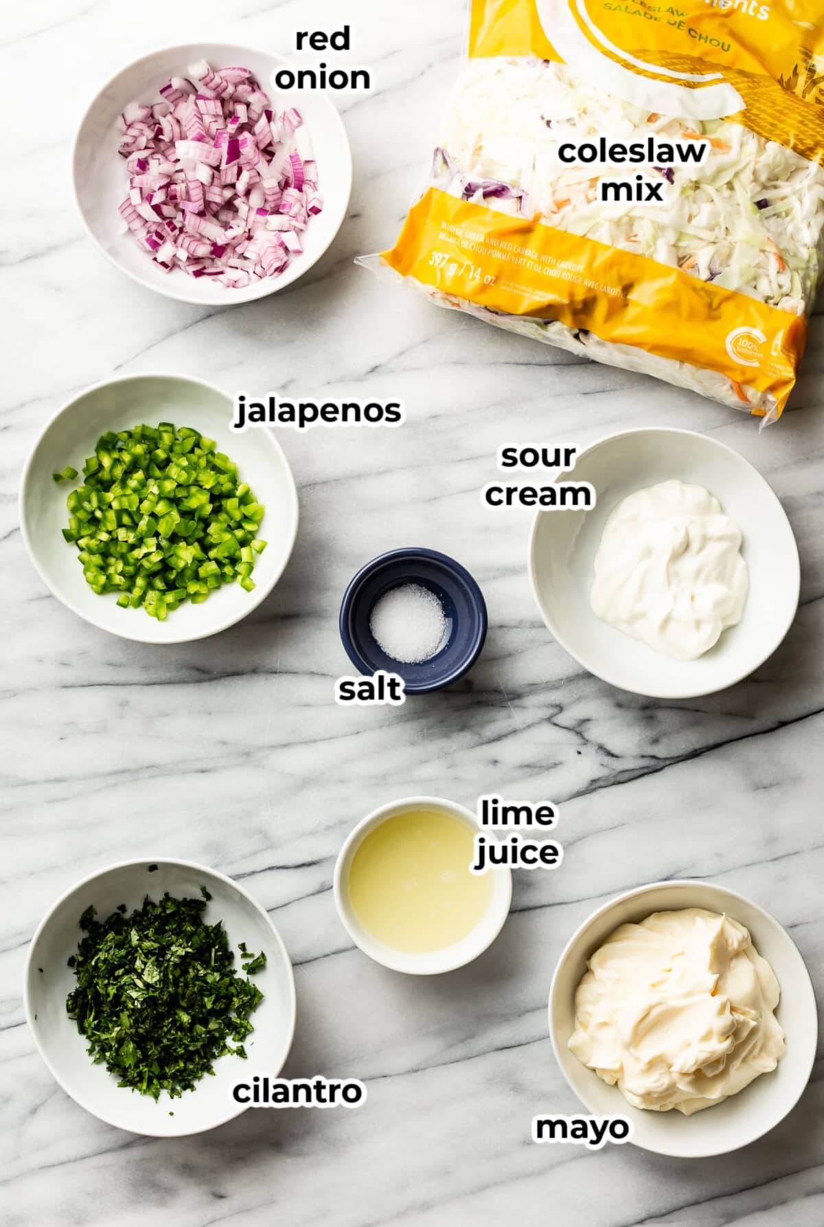 ingredients for jalapeno slaw in prep bowls