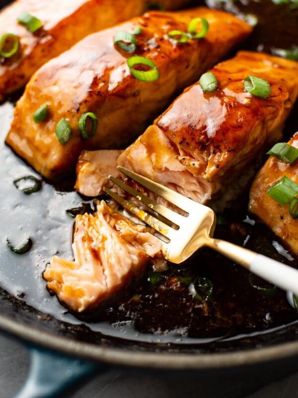 closeup of maple glazed salmon with a fork