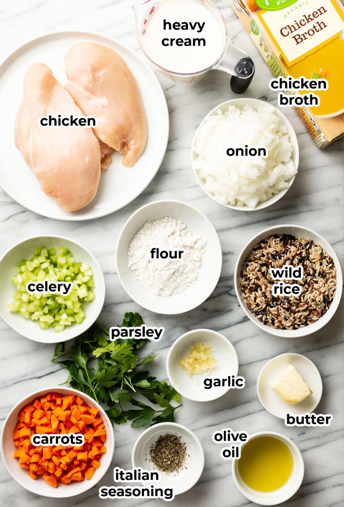 ingredients for chicken and wild rice soup in prep bowls