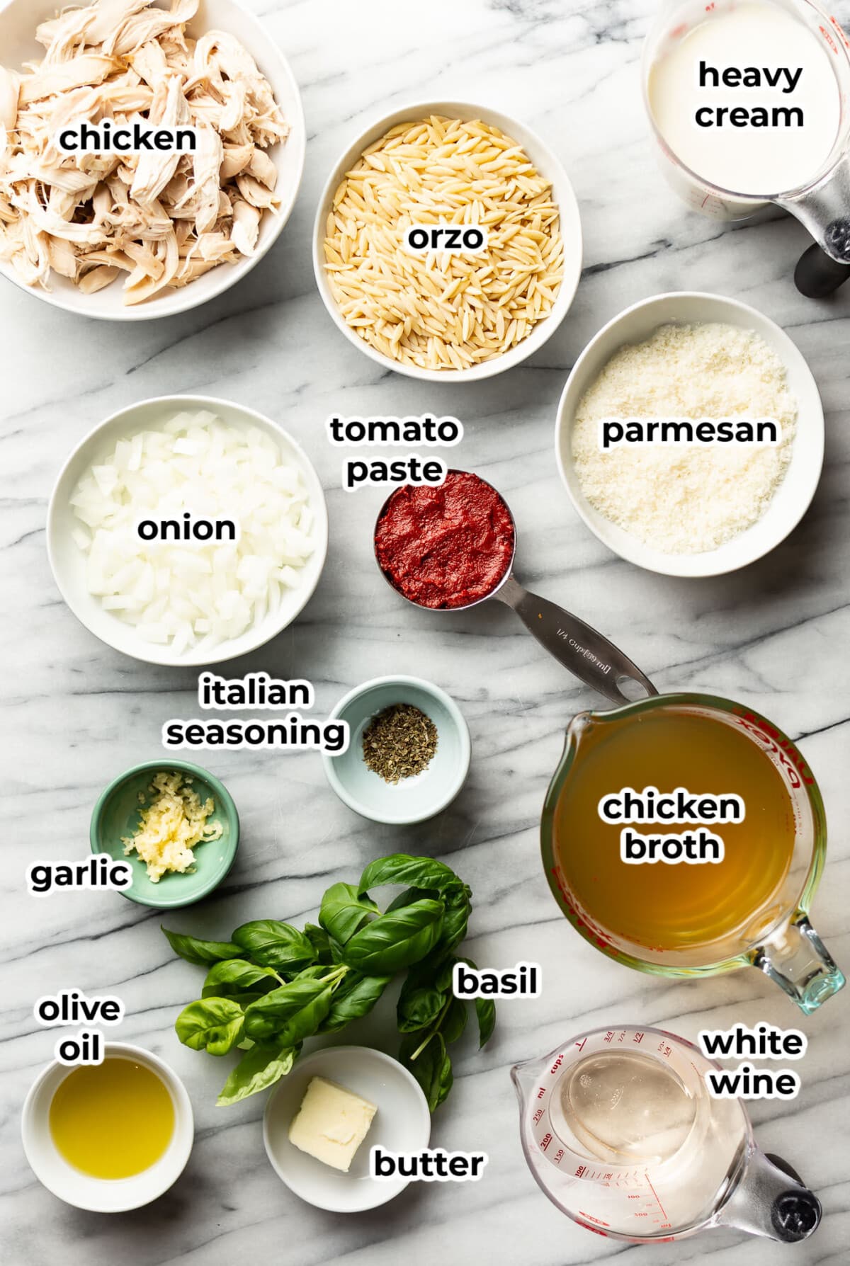 ingredients for creamy tomato orzo with chicken in prep bowls