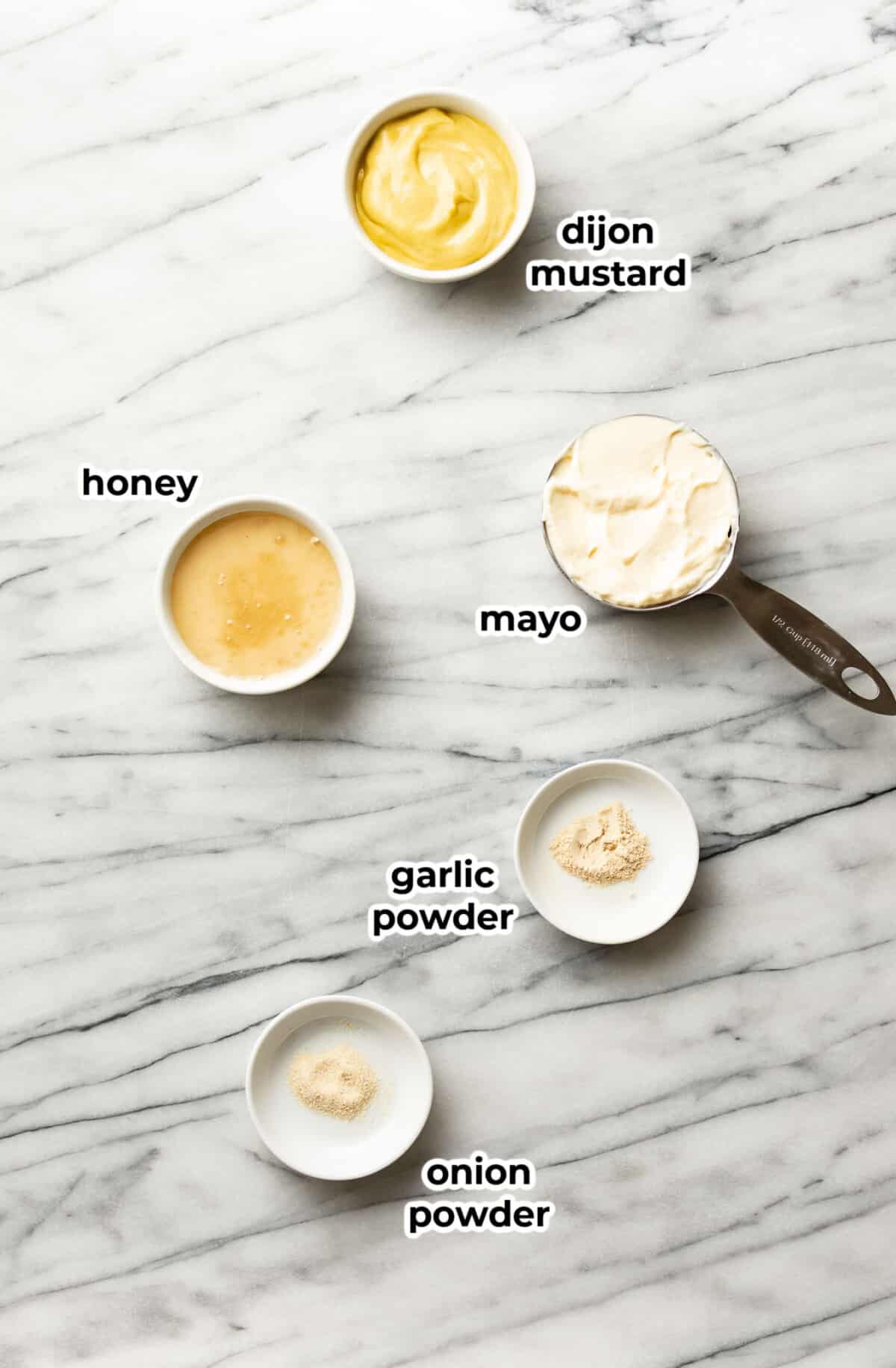 ingredients for honey mustard dipping sauce in prep bowls