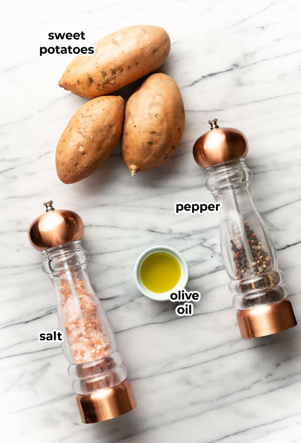 ingredients for roasted sweet potatoes on a marble counter