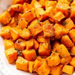 a bowl of diced roasted sweet potatoes