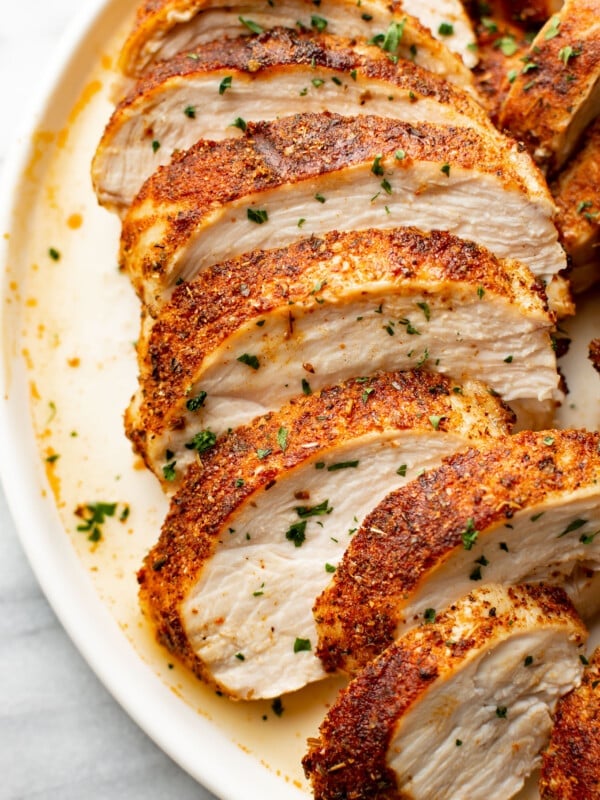 a plate with sliced air fryer chicken breast