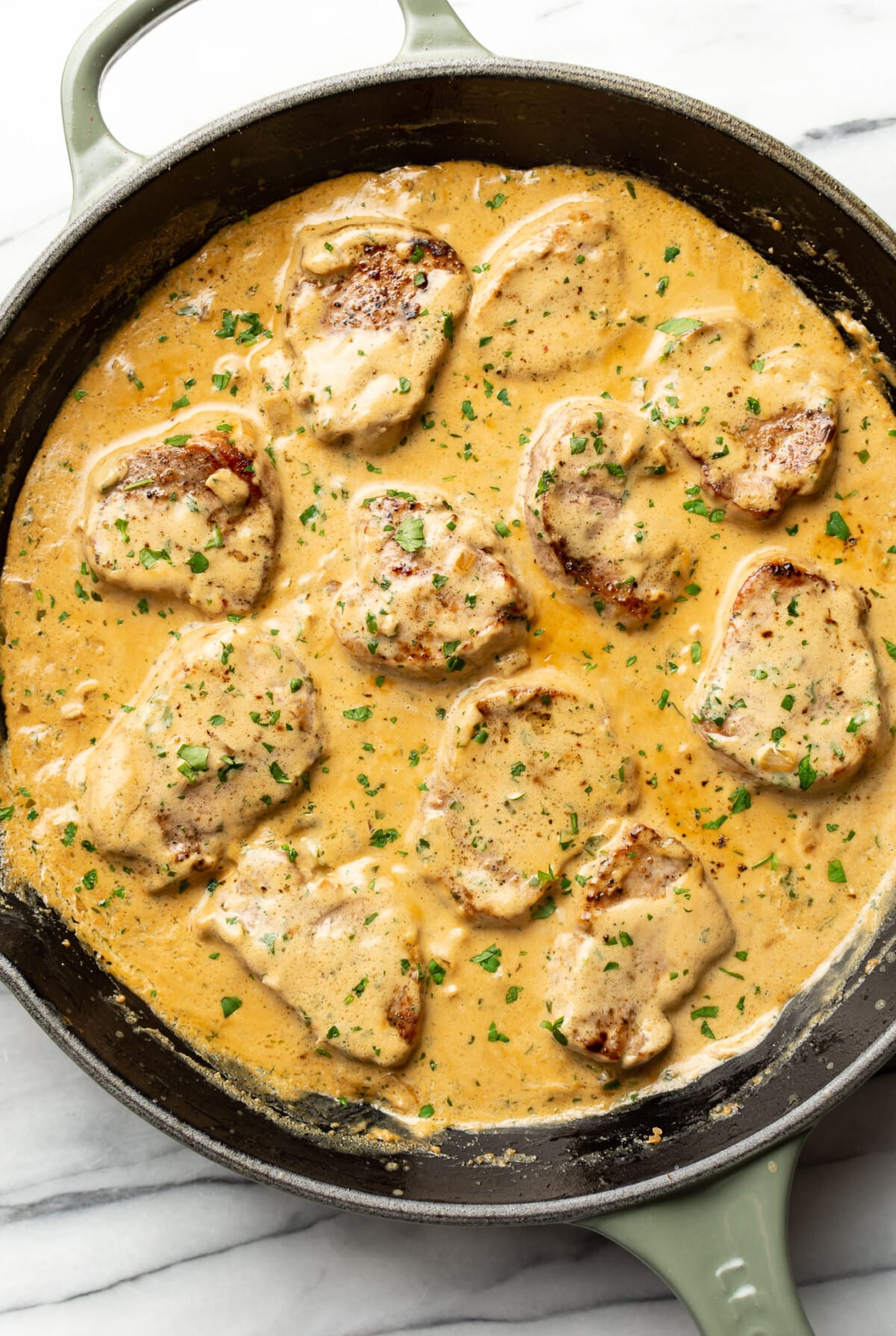 a skillet with boursin pork tenderloin