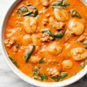 a bowl of creamy italian sausage gnocchi soup