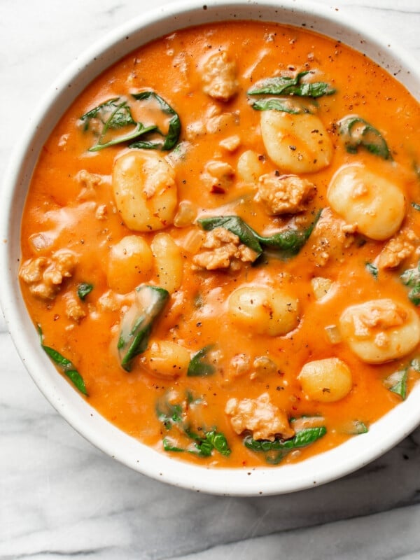 a bowl of creamy italian sausage gnocchi soup