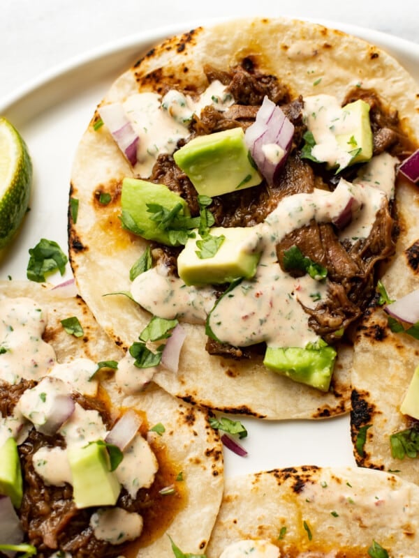 crockpot shredded beef tacos on a plate