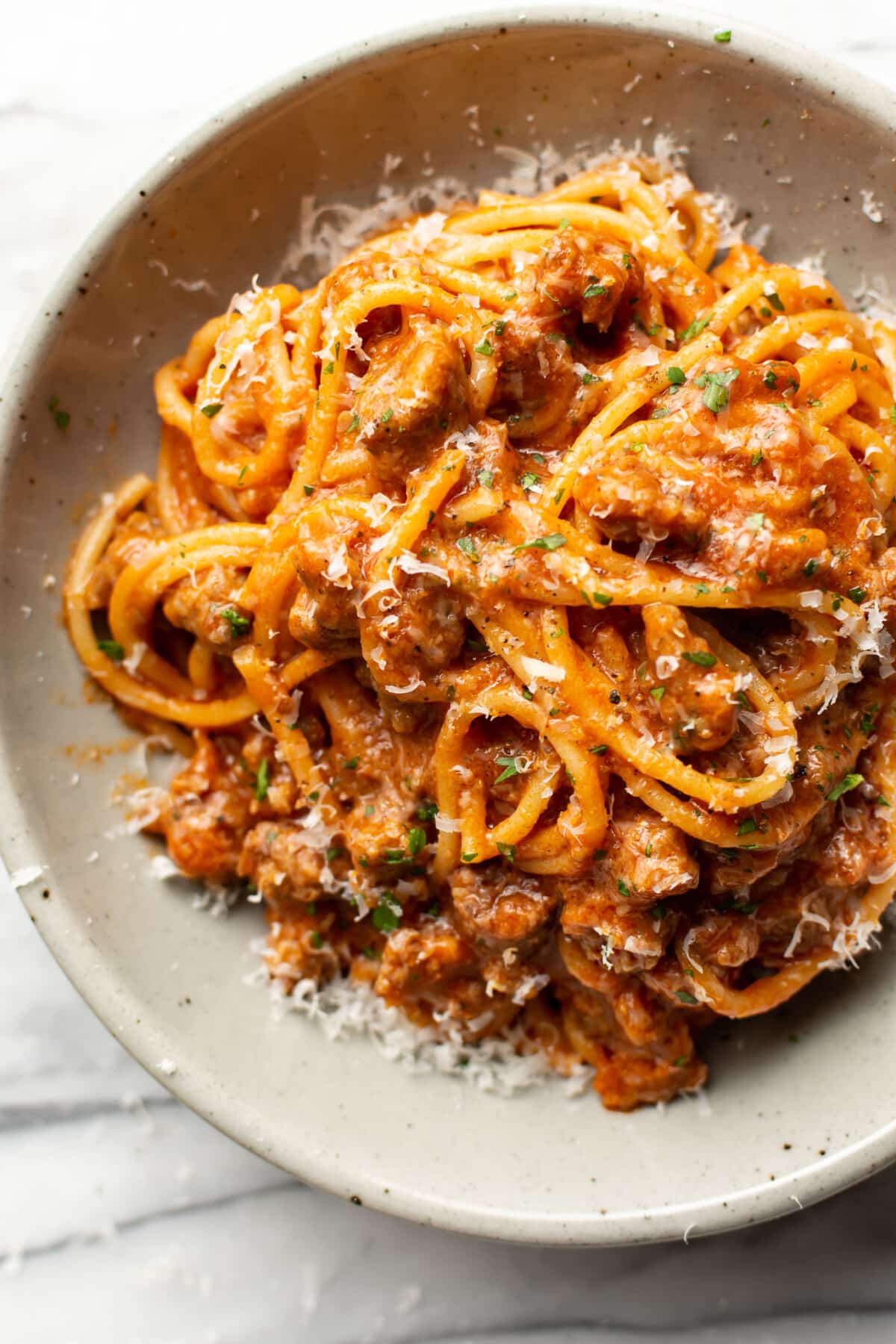 a bowl with one pot italian sausage spaghetti