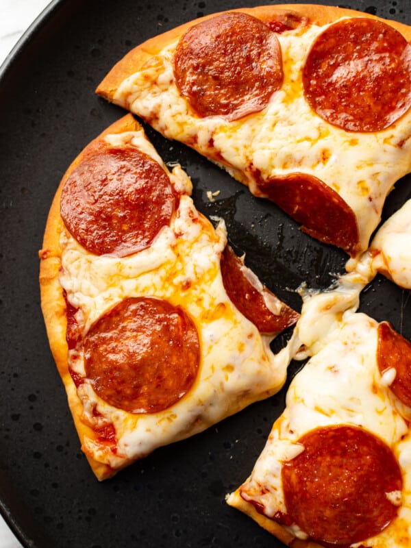 a plate with slices of naan pizza