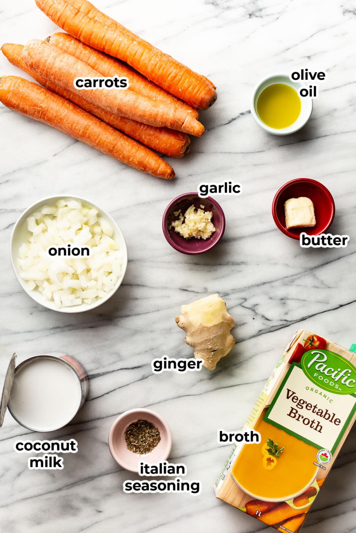 ingredients for carrot ginger soup in prep bowls