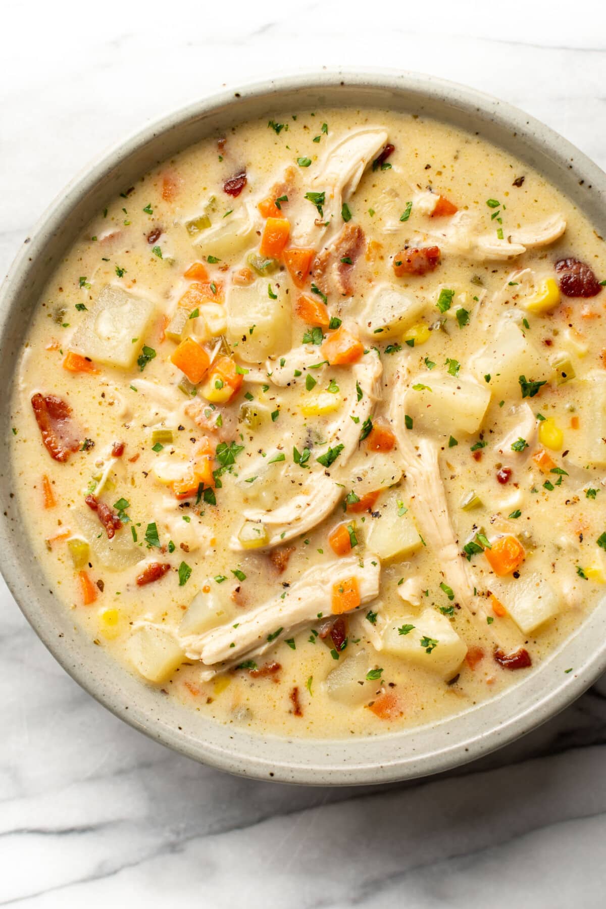 a bowl of chicken and potato soup